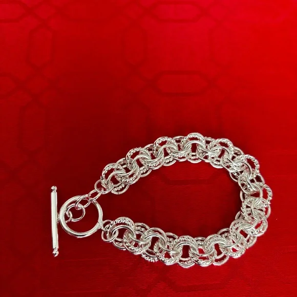 NEW 925 STERLING SILVER INTERWOVEN CIRCLES
BRACELET WITH TOGGLE CLASP  … - Picture 2 of 7